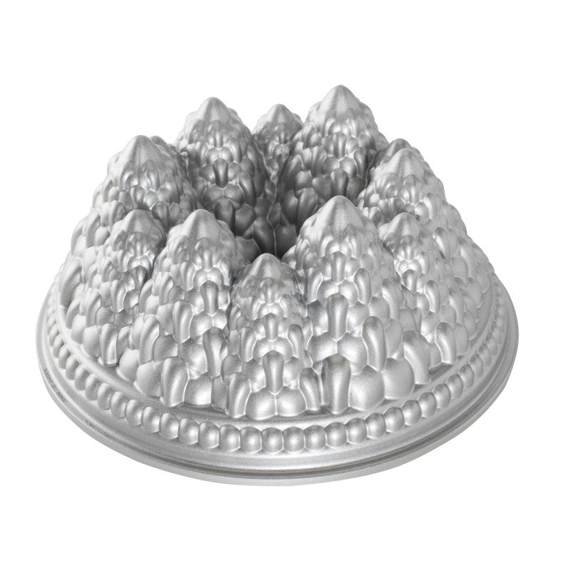 Moule à gâteau Bundt Forêt de sapins Silver    - Nordic Ware - Moule à gâteaux -  - La Guilde Culinaire